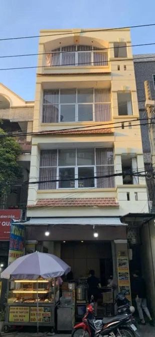 Nhà bán: đường Giải Phóng. Gần sân bay Tân Sơn nhất. DTSD 145m2. 4 tầng. Giá 35,8 tỷ - 11