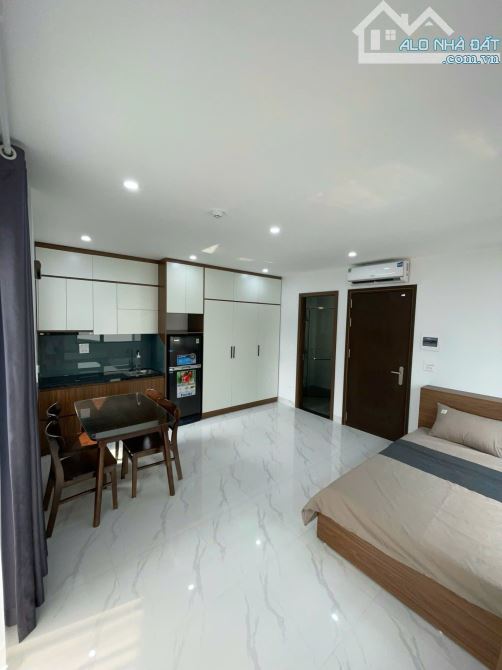 TÒA CHDV KHƯƠNG ĐÌNH 7 TẦNG,THANG MÁY, 2 THOÁNG, 12 PHÒNG KK, DT 700 TR/NĂM - 1