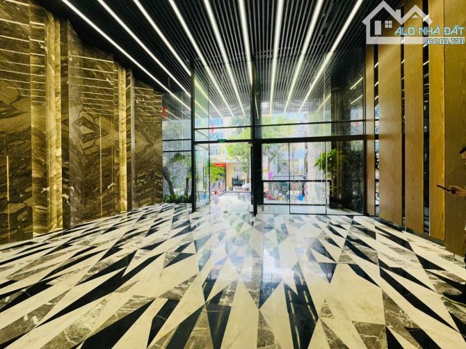 BÁN TOÀ VĂN PHÒNG MẶT PHỐ ĐỘI CẤN 450m2 - 10T THANG MÁY - MT 10m - VỈA HÈ RỘNG - KD 380 TỶ - 2