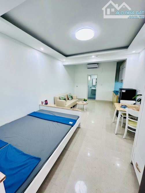 Bán tòa CCMN VŨ TÔNG PHAN 62M2, 6 tầng thang máy,15 phòng kk, full nội thất, DT 80tr/tháng - 2