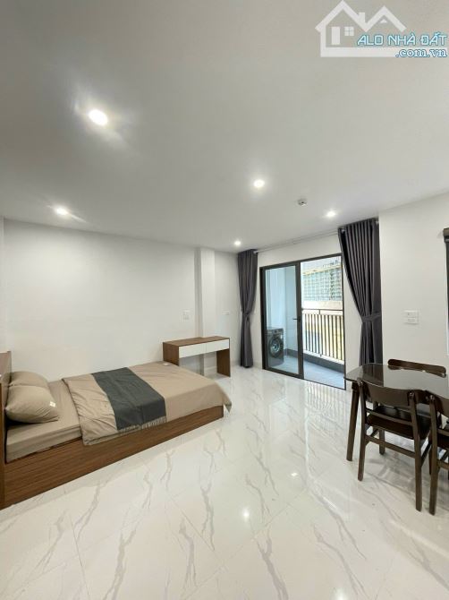TÒA CHDV KHƯƠNG ĐÌNH 7 TẦNG,THANG MÁY, 2 THOÁNG, 12 PHÒNG KK, DT 700 TR/NĂM - 2