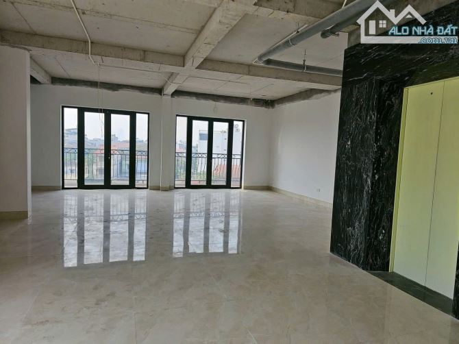 TOÀ VĂN PHÒNG TRÀN ĐĂNG NINH Ô TÔ TRÁNH, VỈA HÈ KINH DOANH TỐT, THANG MÁY 103M GIÁ 87.9 TỶ - 1