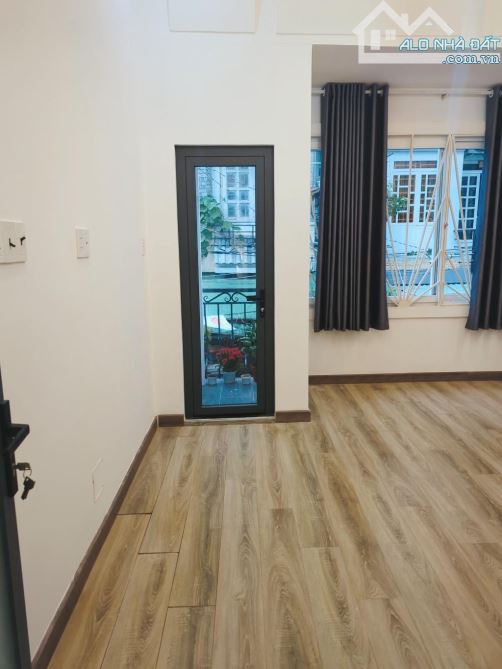 BÁN NHÀ 2 TẤNG PHÚ THUẬN Q7  DTSD60M2 - 3