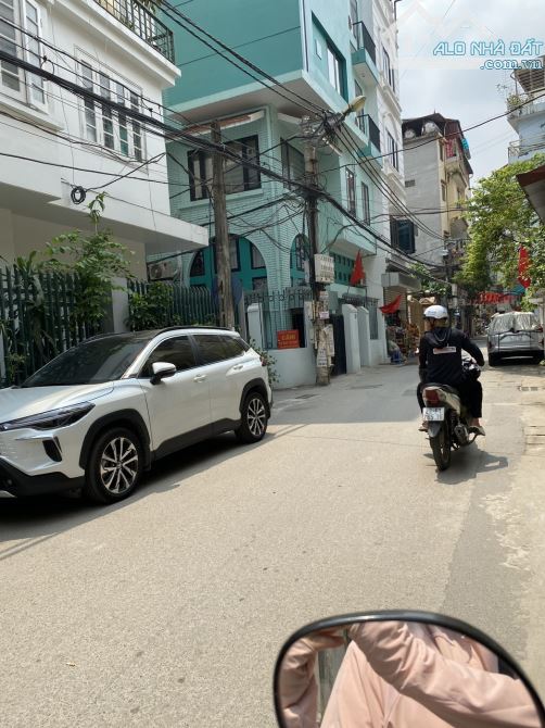 BÁN NHÀ LÔ GÓC TRẦN CUNG 52M X 6 TẦNG THANG MÁY, NGÕ THÔNG, Ô ÔTÔ ĐỖ CỬA, GIÁ 10.45 TỶ