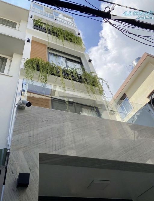 Bán nhà xây mới 100% hẻm 6m Huỳnh Văn Bánh, P13, Phú Nhuận - 4.1x13m sổ a4 - 5 tầng xe hơi - 1