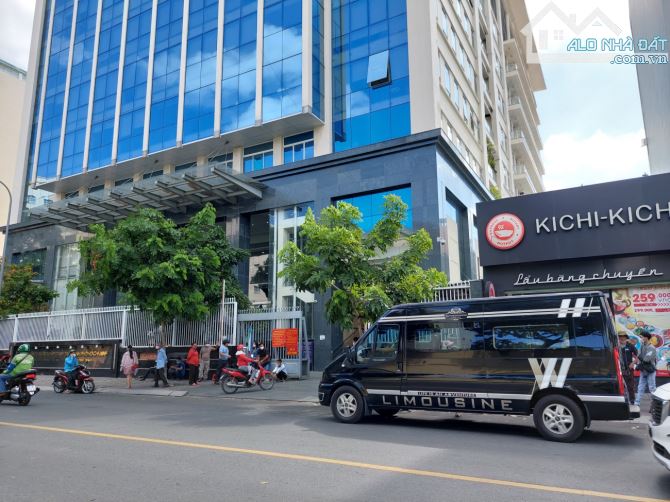 Tòa nhà VP ngay Trần Hưng Đạo DT 8x18m vuông hầm 8 tầng DTSD 1200m2 giá 68 tỷ - 1