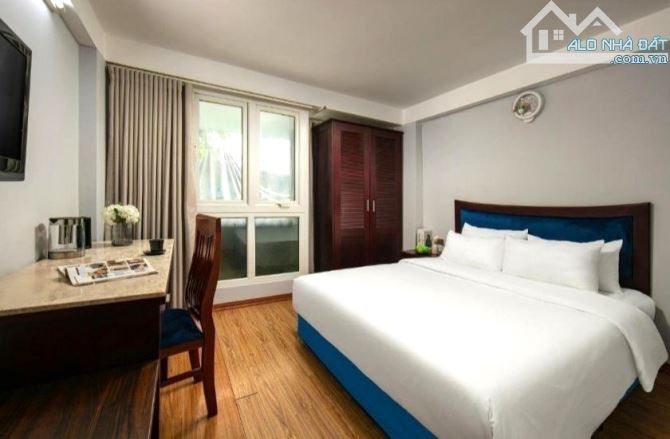 BÁN KHÁCH SẠN MẶT PHỐ ĐÀO DUY TỪ- DÒNG TIỀN GẦN 2 TỶ 5 - 85M2 - 9 TẦNG THANG MÁY - 128 TỶ