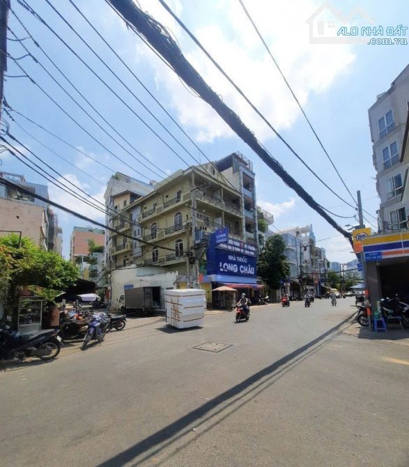 Bán Nhà Góc 3 MT Nguyễn Cửu Vân Q.Bình Thạnh 9x20m - 6 tầng - HĐT 200tr giá chỉ 60 tỷ. - 7
