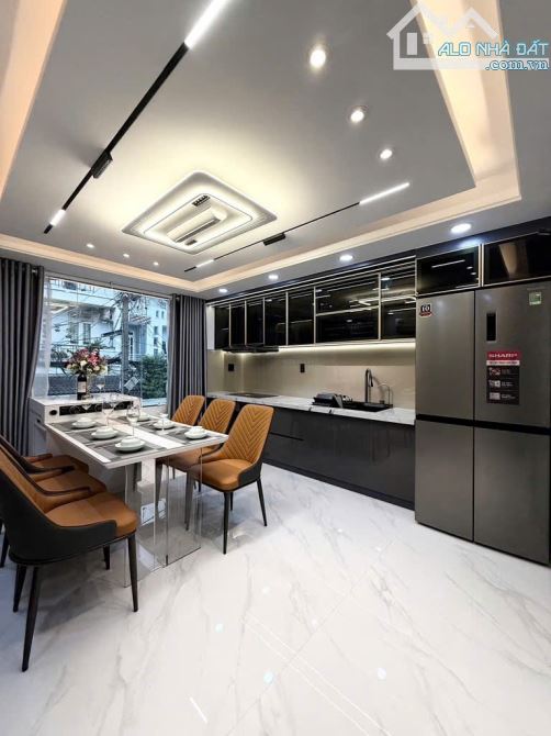 Bán gấp! Giảm ngay 1.5tỷ- Lê quang định-98m2-3 tầng- thang máy xịn- cách MT 30m chỉ 13.2tỷ - 2