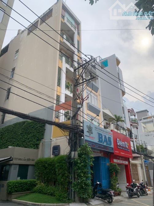 Bán nhà Mặt Tiền Nguyễn Cửu Vân 7 Tầng HDT 75tr/tháng kế bên chung cư saigon View  28 TỶ