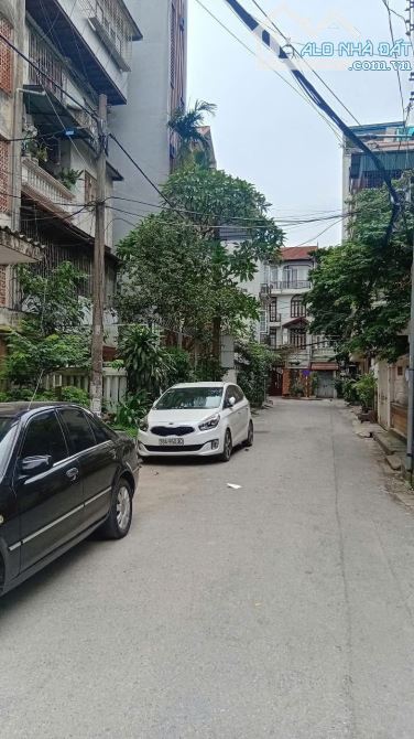 BÁN CĂN HỘ TẬP THỂ T2 NAM ĐỒNG HỒ ĐẮC DI ĐỐNG ĐA - 75M 2PN - SỔ ĐỎ KHỦNG 61M OTO DỪNG ĐỖ - 2