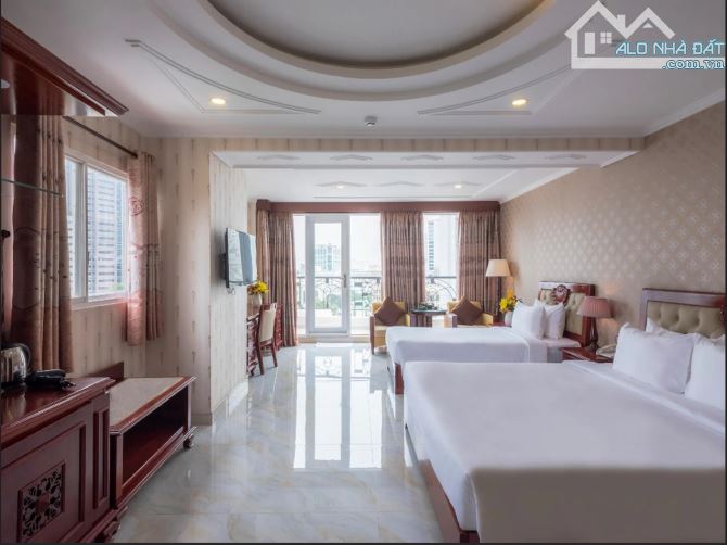 cho thuê khách sạn 65 phòng- mt lê thánh tôn- dt: 235m2- ngang 10m- giá: 1,5 tỷ/th