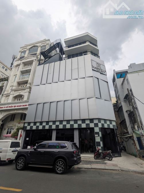 Siêu Phẩm Nhà Góc 2 MT Trần Nhật Duật P.Tân Định Q1 DT:8x16m Hầm 7Tầng HĐT:150Tr Giá:65Tỷ