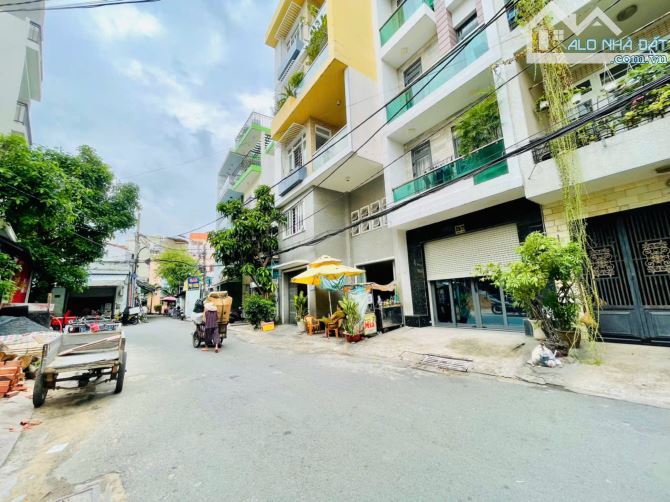 BÁN NHÀ GÓC 2 MẶT HẺM XE HƠI PHẠM VĂN HAI 5TẦNG NGAY CHỢ PHẠM VĂN HAI CHỈ 6,8 tỷ - 1