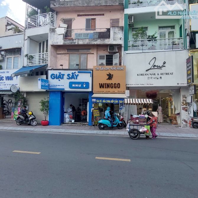 Nhà bán: đường Huỳnh văn Bánh, Q Phú nhuận. DTSD 29m2. 3 Tầng. Giá 9,5 tỷ - 2