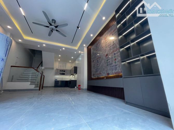 BÁN NHÀ 4 TẦNG  MẶT ĐƯỜNG NGUYỄN BÍNH - 3