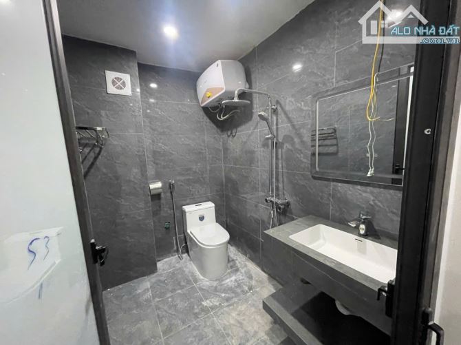 BÁN NHÀ 4 TẦNG  MẶT ĐƯỜNG NGUYỄN BÍNH - 4