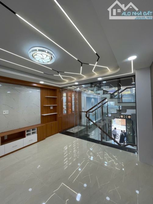 Nhà Mới 100%, hẻm xe tải quay đầu.Vài bước chân ra MT.DT 50m²,5 Tầng ,Chỉ Nhỉnh 8 tỏi - 9