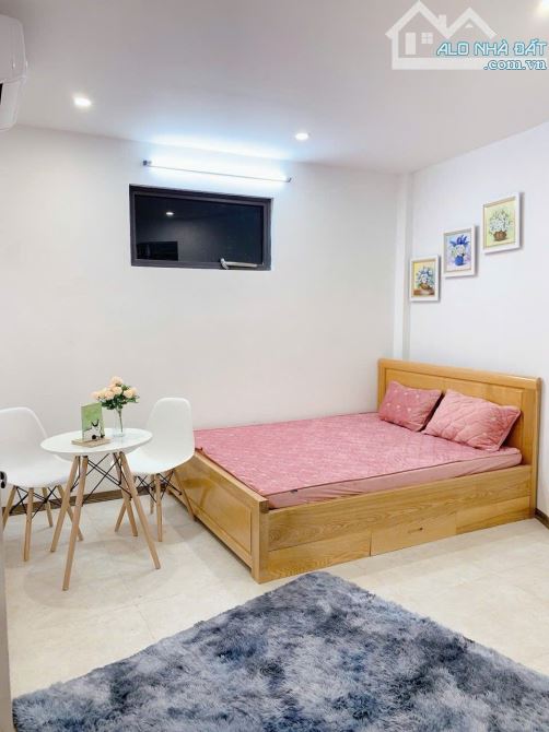 Tòa CHDV ngõ ô tô Vương Thừa Vũ, 84m2*7T, MT 8m, 21 phòng KK, đủ PCCC, dòng tiền 7%/NĂM