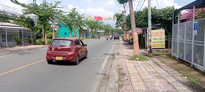 Bán đất tặng nhà mặt tiền QL50 tại Thị Trấn Cần Giuộc - 1