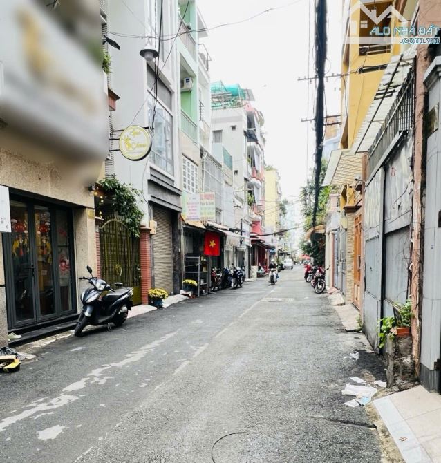 Bán nhà hẻm xe hơi Lạc Long Quân 60m2 NGANG 6.4m 4 tầng 4PN chỉ 10 tỷ