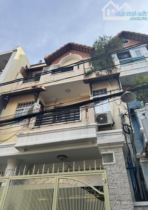 Bán nhà 4 tầng 5PN, xe hơi vô nhà, 63m2 (5.2x12m) Đặng Văn Ngữ Phú Nhuận 14 tỷ x