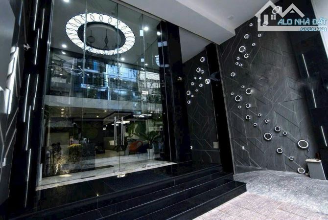 BÁN TÒA NHÀ HẦM 6 LẦU HẺM XE HƠI PHAN ĐĂNG LƯU – KHU PHAN XÍCH LONG, PN. DT 8m x 20m 65 TỶ - 2