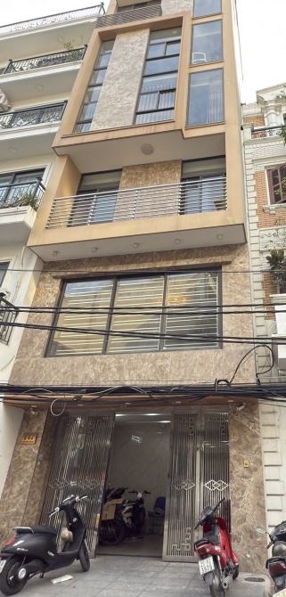 Mặt Phố Hoàng Ngân KD 90Tr/Tháng, 2 Mặt Thoáng Trước Sau, DT 87M 6T MT 4.6M Giá 42.9tỷ.