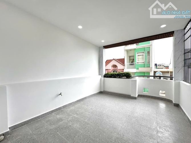 Bán Gấp Nhà để đầu tư cạnh VIp Huỳnh Văn Bánh 4tầng hẻm 10m 140m2 hơn 9tỷ còn TL - 5