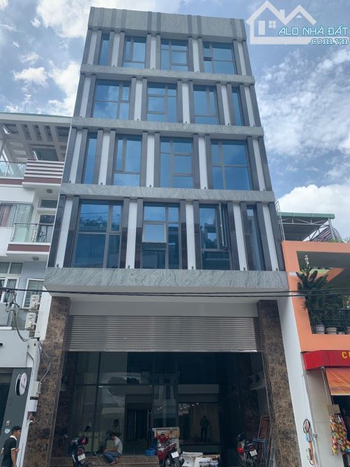 Tòa nhà 2MT trung tâm Quận 3 ngang 9.1m hầm 7 tầng thuê 250 triệu giá 100 tỷ