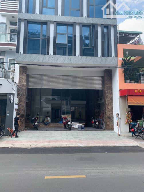 Tòa nhà 2MT trung tâm Quận 3 ngang 9.1m hầm 7 tầng thuê 250 triệu giá 100 tỷ - 1