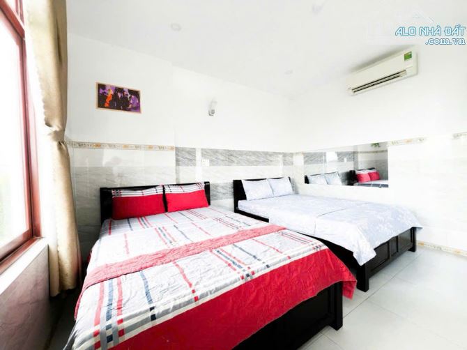 KHÁCH SẠN TRUNG TÂM 4 TẦNG - LÔ ĐÔI- DÒNG TIỀN TỐT- NGAY BẾN XE- GIÁ HẤP DẪN - 7