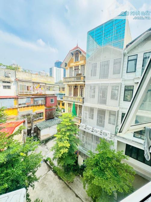 Bán nhà Ngọc Khánh,LÔ GÓC 3 thoáng,THANG MÁY, dòng tiền 500triệu/năm ,DT 90m2  giá 16Tỷ - 4