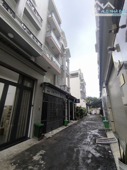 Nhà MỚI HXH 4m Quang Trung P.8 GV. DT: 4X14m. Nhà Trệt Lửng 2 Lầu ST. Giá chỉ 7.3 tỷ TL
