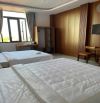 Bán KHÁCH SẠN ngay KDC Nam Long Hà Huy Giáp ngang 9m 7 lầu 180m2 26PN T.máy TN 70tr 25 tỷ