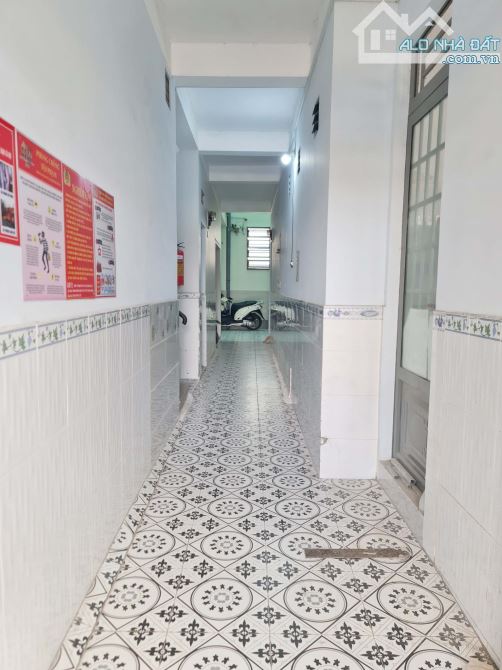 Bán CHDV 16 phòng, đất (8m x 18m), hẻm xe hơi đường Phạm Hùng, Quận 8. Đang kinh doanh có