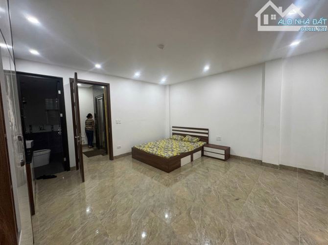 Bán nhà mặt phố Tây Sơn - 8 tầng thang máy cho thuê 70tr/ tháng - chào giá 28.2  tỷ . SDCC - 5