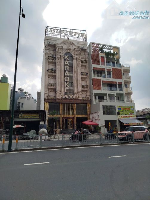 Cần bán gấp Building mặt tiền Dương Quảng Hàm 12x50m hầm 8 lầu chỉ 122 tỷ