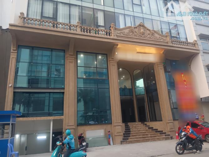 Bán tòa nhà văn phòng 9 tầng tại mặt phố Hoàng Cầu 230m2, mt 11m2, 2 thoáng, chỉ 116 tỷ. - 1