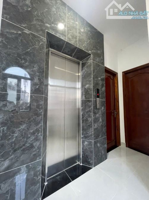 Tòa CHDV 158/56 Nguyễn Văn Đậu DT 7,4x13,6 CN 78m 5 tầng, thang máy, 14 phòng  giá 15,5 tỷ - 2