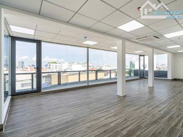 Tòa VP 7 tầng 54/3 Đào Duy Anh – DT 12x13 121m², HĐ thuê 110tr/tháng – giá chỉ 37 tỷ TL - 2
