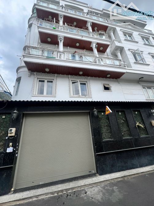 BÁN NHÀ, đường Đặng Văn Ngữ, Q. Phú Nhuận, Kc 1Trệt 4 lầu cao cấp  Dt:7 x 9m. Giá 15tỷ900