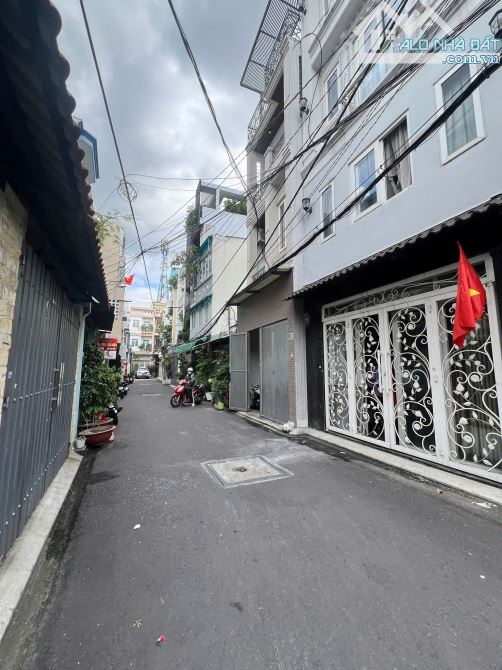 BÁN NHÀ, đường Đặng Văn Ngữ, Q. Phú Nhuận, Kc 1Trệt 4 lầu cao cấp  Dt:7 x 9m. Giá 15tỷ900 - 1