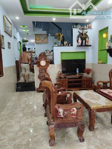 Bán Nhà 2 tầng mặt tiền đường TL17 phường THẠNH LỘC Q12, dt 100m²(5x24).DÒNG TIỀN 12tr/th - 2