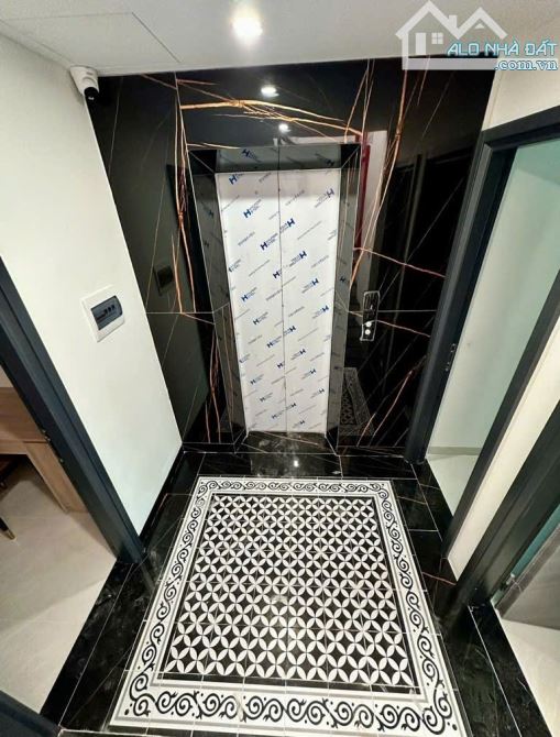 Bán nhà Trịnh Văn Bô 62m2- 6T Thang máy, ô tô đường thông, giá 12.88tỷ - 2