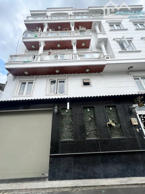 BÁN NHÀ, đường Đặng Văn Ngữ, Q. Phú Nhuận, Kc 1Trệt 4 lầu cao cấp  Dt:7 x 9m. Giá 15tỷ900 - 4