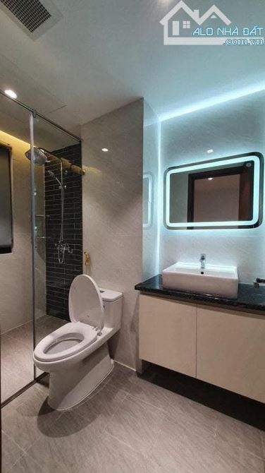 BÁN NHÀ HOÀNG CẦU ĐỐNG ĐA 63m X7 TẦNG THANG MÁY - MT 4.2m - GIÁ: 15.2 TỶ - 2