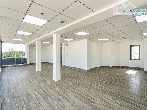 🔥 Toà nhà văn phòng ngang 12M khu sân bay - HDT 140 triệu/tháng - 7 tầng ốp kính - 38 tỷ - 3