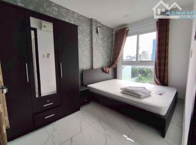 Bán tòa nhà 1h6L CHDV 24P đường Cử long, Q.TB, DT: 8x 18m, sẵn hđt 135tr/tháng, giá 43 tỷ - 5