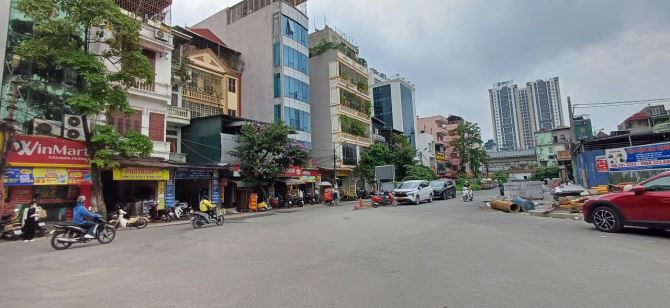 Bán nhà đường Nguyễn Trãi, cạnh ĐH Hà Nội, 3 mặt đường, 4 chỗ đỗ cổng, thang máy 100m2